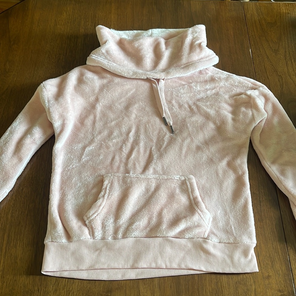 light pink turtle neck sweatshirt